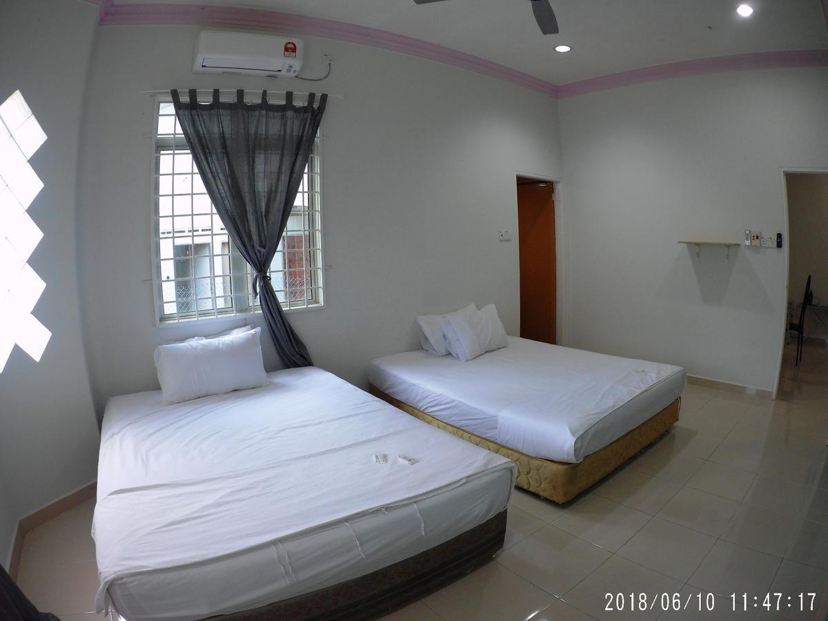 Fbs Guesthouse Дунгун Екстериор снимка