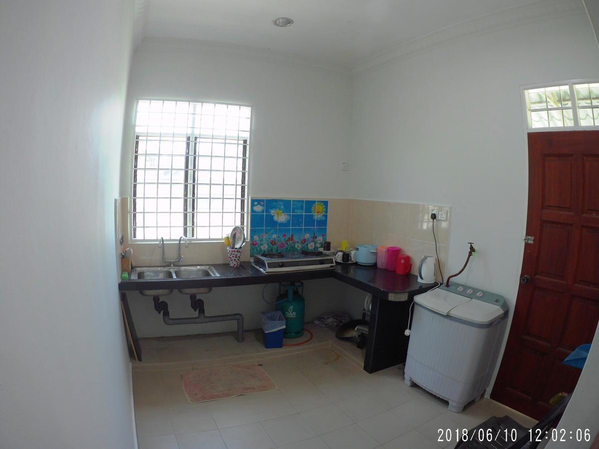 Fbs Guesthouse Дунгун Екстериор снимка